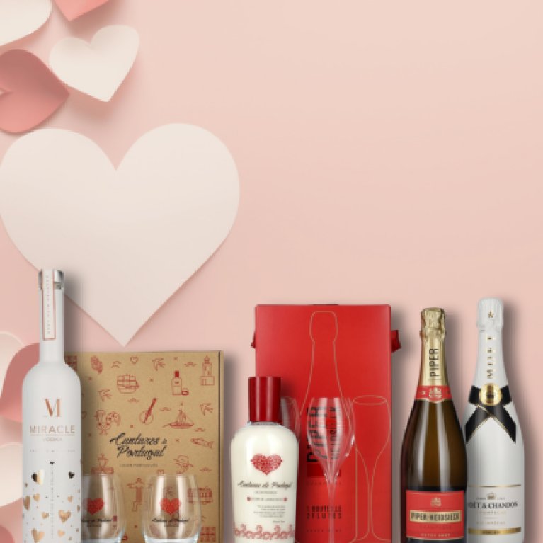 4 alcoholic bottles on a background with hearts.