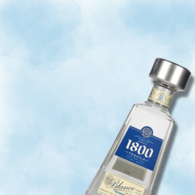 1800 Tequila Reserva Silver on a blue background
